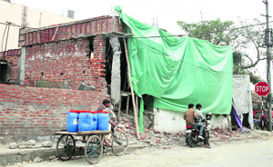 One of the illegally constructed buildings recently demolished by the Municipal Corporation in Jalandhar.