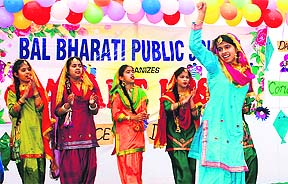 Students perform during the Basant Utsav at Bal Bharati Public School in Ludhiana.