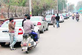 Vehicles parked illegally outside the district courts complex in Amritsar