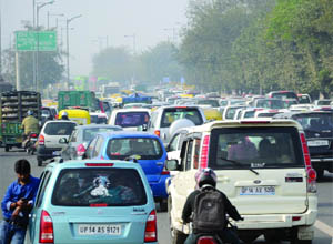Heavy traffic jam witnessed at NH-24 on Monday as Nizamuddin Bridge in New Delhi is closed for repair work. 