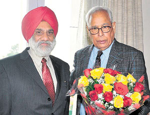 Vice-Chancellor of the University of Jammu Prof Mohan Pal Singh Isher with Governor NN Vohra at Raj Bhawan in Jammu on Monday.