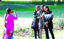 Girls pose for a group photograph at Rose Garden in Bathinda on a pleasant Tuesday afternoon. 