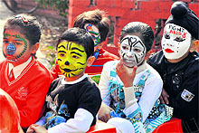 Students send across social messages through a face-painting competition at Aanchal International School in Chandigarh on Tuesday
