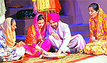 Artistes stage the play Neon Jarh at the department of Indian theatre, Panjab University, on Tuesday