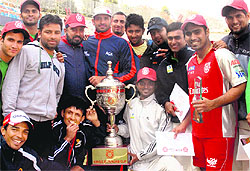 Members of the KXIP Green team after winning the cricket cup at the PCA Stadium in Mohali on Tuesday
