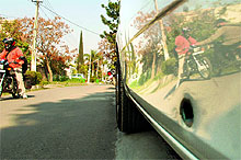 One of the cars damaged during a shootout at Phase VII on Monday night, which bears a bullet mark, parked outside the residence of the vehicle owner at Phase X in Mohali on Tuesday