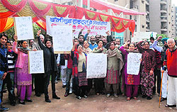Residents protest against the builder at the Bollywood Heights Society in Zirakpur on Tuesday