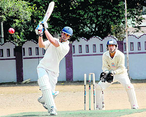 A batsman in action in a match in the 60th Dehrdun District Cricket Tournament in Dehradun on Tuesday. A Tribune photograph