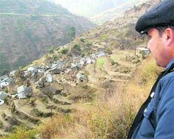 A tourist looks at the terrace of Moriana Top situated in the Dhanaulti Assembly segment, 60 km from Mussoorie.