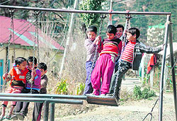 Children make the most of a sunny day in Shimla on Tuesday