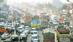 Vehicles queue up during a traffic jam near Ram Mandi chownk in Jalandhar 