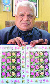 An avid collector Yashpal Bangia with his collection of stamps. 