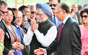 Mauritian PM Navinchandra Ramgoolam, who is in India on a six-day visit to ramp up bilateral economic and security ties, introduces PM Manmohan Singh to his delegation at the Rashtrapati Bhawan in New Delhi on Tuesday.