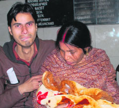 The parents of the baby boy who died at the GMSH-16, Chandigarh, on Wednesday evening. Tribune photo: Parvesh Chauhan