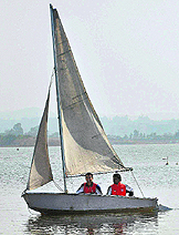 Members of Punjabi University, Patiala, team take part in the Inter-University Yatching Competition at the Sukhna Lake in Chandigarh on Wednesday.