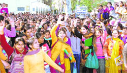 Students of Government Women College protest against an increase in the fine by the college administration in Karnal
