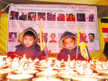 Tibetan children attend a mass prayer at the main temple in McLeodganj on Wednesday. 