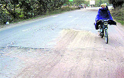 Potholed road near Grewal Stadium at Kila Raipur