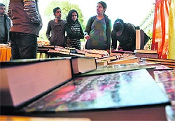 Students at a book fair being held on the PAU campus in Ludhiana on Wednesday