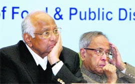 Union Finance Minister Pranab Mukherjee (R) and Agriculture Minister Sharad Pawar at the Conference of Food Ministers and Agriculture Ministers of states/UTs on Targeted Public Distribution System and Storage in New Delhi on Wednesday. 