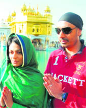 Actress Neeru Bajwa and Punjabi singer Sukhbir at the Golden Temple in Amritsar
