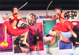 Artistes from Kerala perform marshal arts of the state in Sector 17, Chandigarh, on Thursday. 