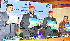 RK Pachauri (centre), Director-General, TERI, and CM PK Dhumal at a function in Shimla on Thursday