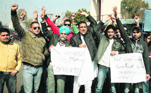 The National Panthers Students Union protests against corruption in the state, in Jammu on Thursday. 