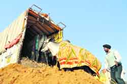 A disappointed farmer returns with his bullock back from Kila Raipur 