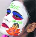 A student sports a painted face at the DMCH in Ludhiana