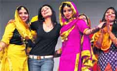 Punjabi actress Neeru Bajwa dances with students of Guru Nanak Girls College, Ludhiana,