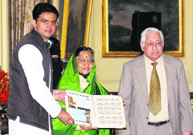 President Pratibha Patil with Union Minister of State for Telecommunication & IT Sachin Pilot (L) and former Attorney General Soli J Sorabjee releases the commemorative postage stamp and first day cover on the occasion of the golden jubilee of India International Centre in New Delhi on Thursday