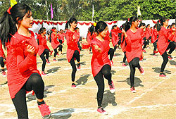 Girls perform exercise at the annual sports function of Postgraduate Government College for Girls, in Sector 42, Chandigarh, on Friday