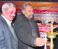S. Ramaswamy, state Principal Secretary, Health, (second from left) lights a traditional lamp to inaugurate a training programme in Dehradun