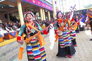Tibetan artistes present an item at a function in honour of Archbishop Desmond Tutu at McLeodganj on Friday.