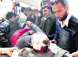 An injured being shifted to the Government Medical College and Hospital in Jammu on Friday