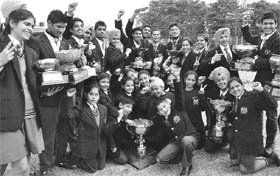 Students after receiving trophies at the 33rd Founders Day celebrations of Yadavindra Public School, SAS Nagar, Mohali, on Saturday