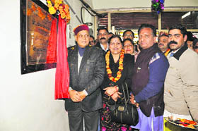 Chief Minister PK Dhumal inaugurates the Kangra Central Cooperative Bank branch in Hamirpur on Saturday.