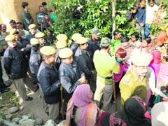 Police force deployed at Abdullahpur village to avert any untoward incident.