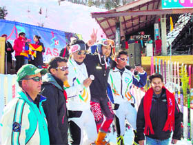 Anurag Thakur, joint secretary, BCCI, gives away prizes to winners on the concluding function of the Alpine Premier League at the Solang Ski Slopes near Manali. 