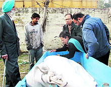 Family members of the deceased, Satnam Singh, in a shock after his body was on tracks near thje Jalandhar railway station on Saturday