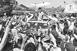 Myanmars Aung San Suu Kyi delivers a speech to supporters in Kawhmu on Saturday