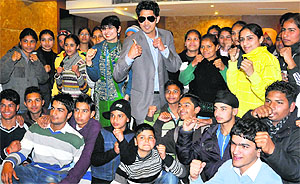 Boxer Vijender Singh with budding kick boxers in Chandigarh on Sunday