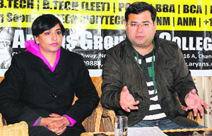 Anshu Kataria, Chairman, Aryans Group of Colleges, Chandigarh, talks to mediapersons in Shimla on Sunday.