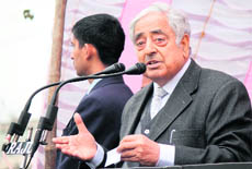 PDP patron Mufti Mohammad Sayeed addresses a rally at Bana Chak village in Bishnah on Sunday.