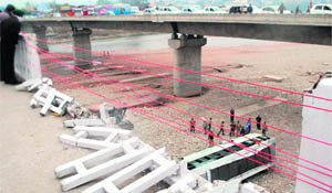 The bus driven by Lucky that plunged into the Tawi riverbed in Jammu on Sunday. 