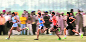 Young boys take part in a 1,500m race;