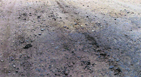 The Sahnewal-Kohara road in a dilapidated condition.