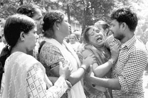 Inconsolable kin of the four Nationalist Congress Party workers who were electrocuted to death in Kalwa area of Thane on Sunday morning