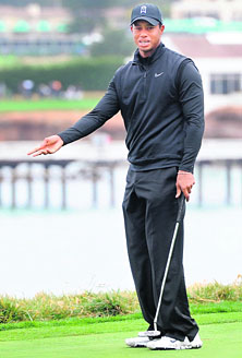 Tiger Woods reacts to his missed putt during the AT&T Pebble Beach National in California on Sunday. 